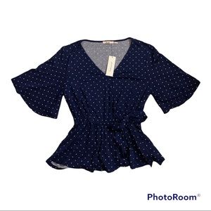 Size XXS Francesca‘s navy blue with white polkadots top.